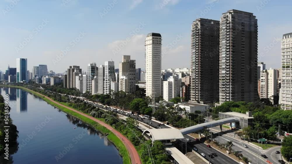 Aerial Drone View Of A Big City With A River And Highway (Sao Paulo, Brazil) Aerial Drone View Of A Big City With A River And Highway (Sao Paulo, Brazil)