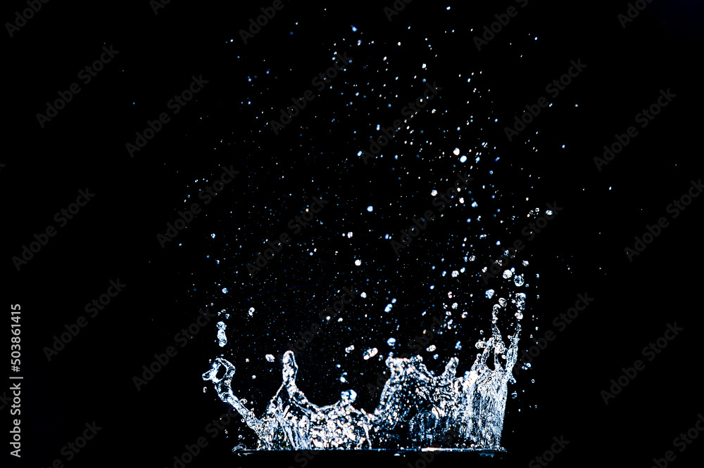 Abstract background of Water splashing on a black background. idea for freshness