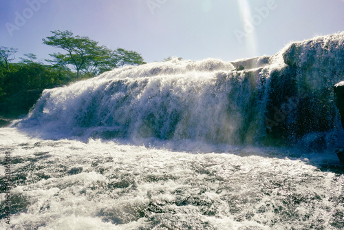 Scenic view of Kimani waterfalls in Mpanga Kipengele Game Reserve, Tanzania photo