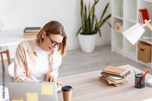 Female student studying in ...