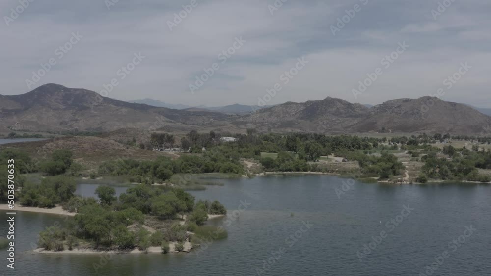 A beautiful aerial drone shot, drone flying towards the mountain lines in Lake Skinner - Temecula - Riverside County - California A beautiful aerial drone shot, drone flying towards the mountain lines in Lake Skinner - Temecula - Riverside County - California
