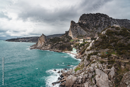 Coastal seascape landscape with Mount Cat or Koshka from rock Diva on cloudy weather. Simeiz, Crimea © Elena Odareeva