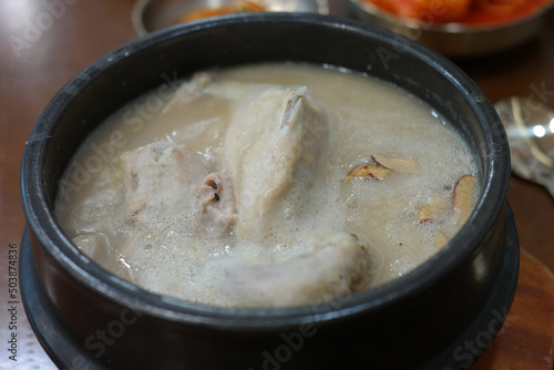 Samgyetang is a healthy Korean food made by boiling young chicken, ginseng, and jujube in an earthenware bowl.