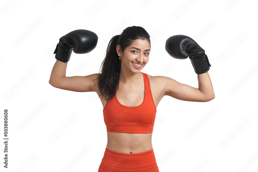 Young Venezuelan woman boxer smiling and looking at camera. Isolated over white background. Young Venezuelan woman boxer smiling and looking at camera. Isolated over white background.
