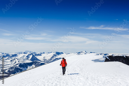 Extreme Sport. Lone hiker in winter mountains