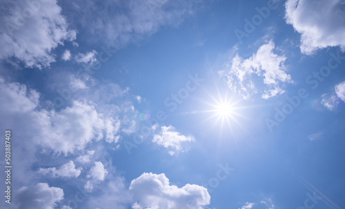 Sun light flare and Building motions white clouds.fluffy clouds sky Cloudscape Concept Nature background and Travel. Website. Environment background