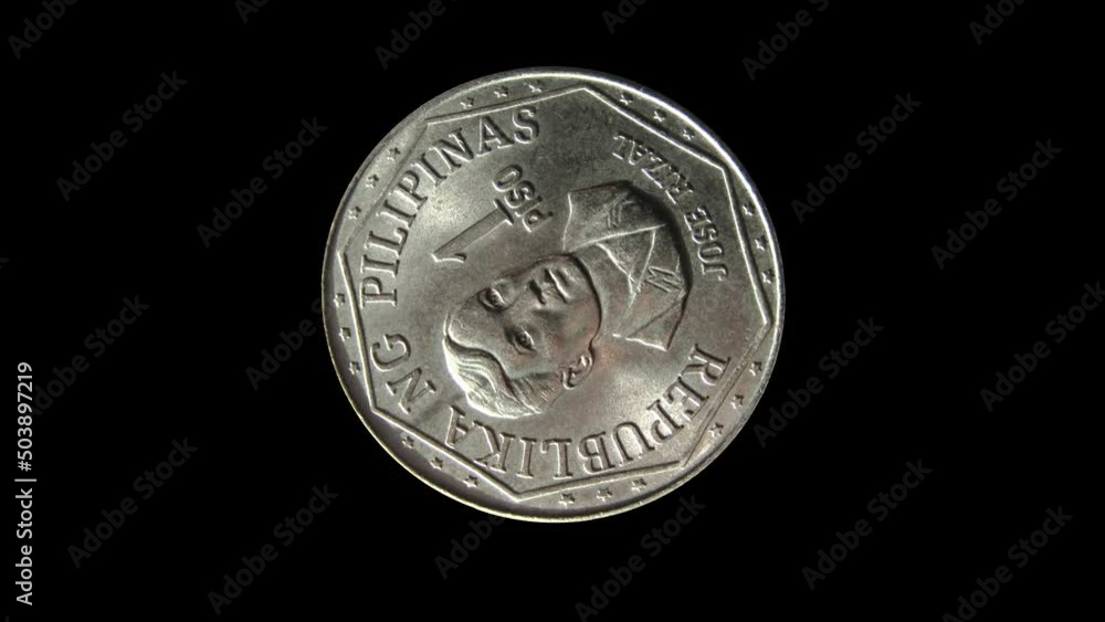 Rotating obverse of Philippines coin 1 piso 1978 with inscription meaning REPUBLIC OF PHILIPPINES and portrait of Jose Rizal. Isolated in white background. Rotating obverse of Philippines coin 1 piso 1978 with inscription meaning REPUBLIC OF PHILIPPINES and portrait of Jose Rizal. Isolated in white background.