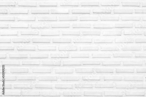 White grunge brick wall texture background for stone tile block painted in grey light color wallpaper .