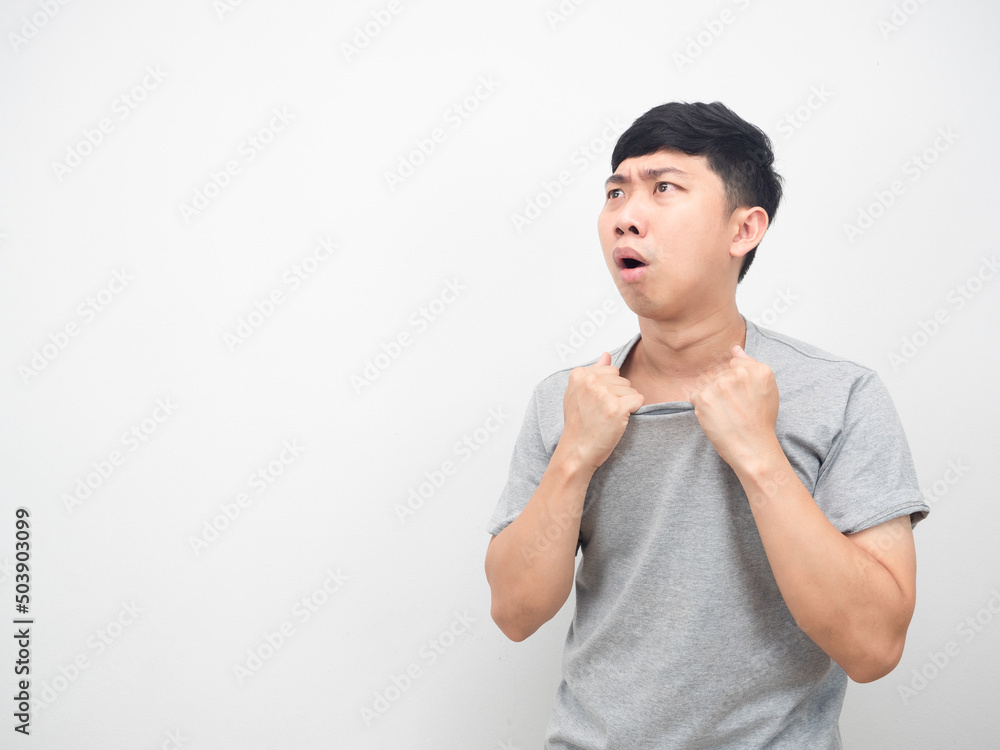 Man feeling weather it hot gesture looking at copy space Man feeling weather it hot gesture looking at copy space