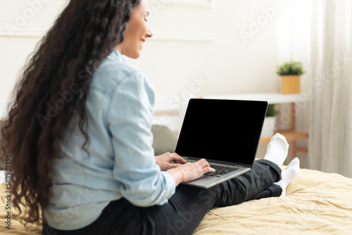 Woman Using Laptop With Black Empty Screen, Mockup Template