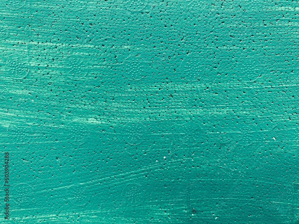 an uneven blue-Green mottled surface
