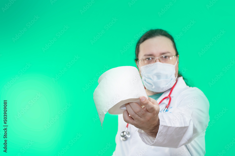 A doctor in a white coat and mask hand over a roll of toilet paper. A doctor in a white coat and mask hand over a roll of toilet paper.