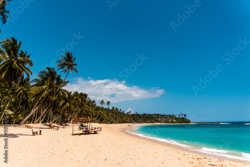 Tropical landscape, paradise beach against the blue ocean, perfect vacation in silence.