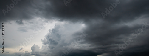 Rain clouds and black sky textured background. Danger storm cloud, Black cloud and thunder storm, Dark sky and motion clouds before rainy.
