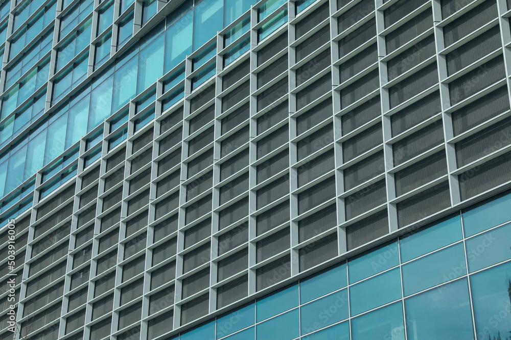 Modern building, low angle view. Urban architecture Modern building, low angle view. Urban architecture