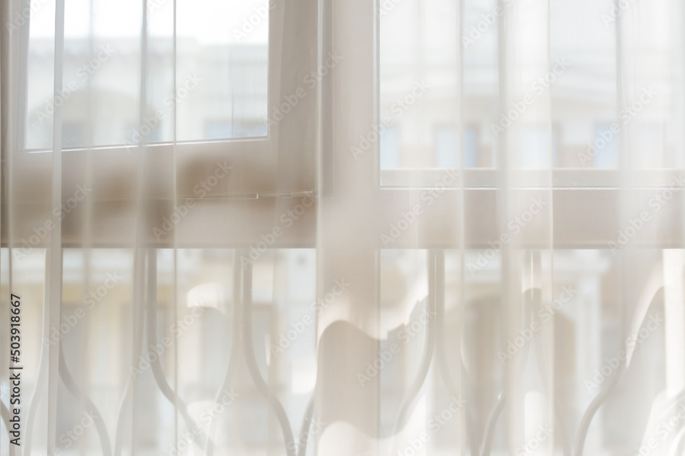 Window behind white curtain indoors in morning Window behind white curtain indoors in morning