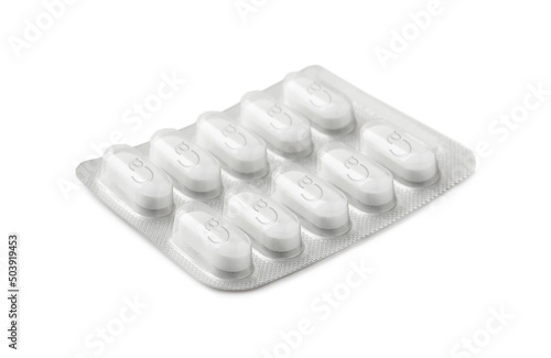 Calcium supplement pills in blister pack on white background