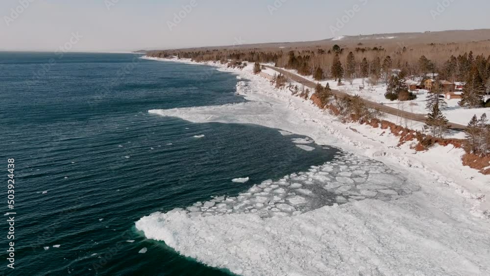 Icy-cold Water Of Lake Superior With Ice Starting To Melt On Later Part Of Winter In Duluth, Minnesota. - aerial Icy-cold Water Of Lake Superior With Ice Starting To Melt On Later Part Of Winter In Duluth, Minnesota. - aerial
