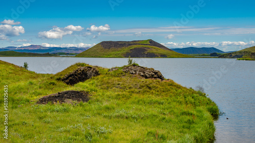 Pseudo craters, volcanoes and geothermal areas near Skutustadir and lake Myvatn in Iceland, summer with blue sky at sunny day.