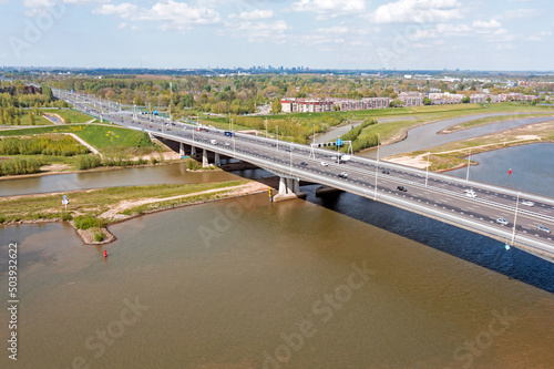 Aerial from bridge over the river Lek with the highway A2 near Utrecht in the Netherlands