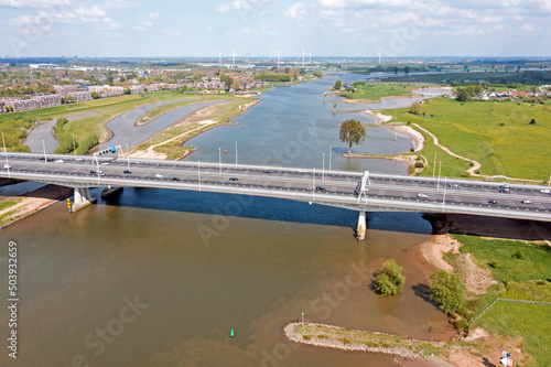 Aerial from bridge over the river Lek with the highway A2 near Utrecht in the Netherlands