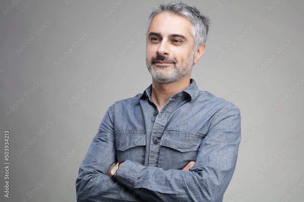 Mature man with arms crossed Mature man with arms crossed