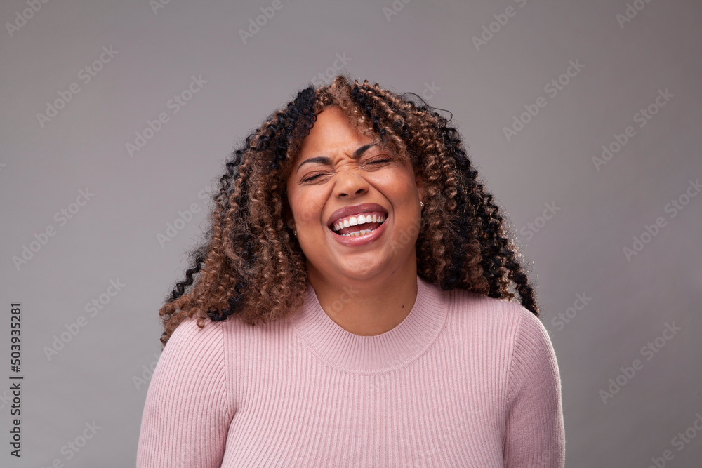 Mid adult woman laughing Mid adult woman laughing