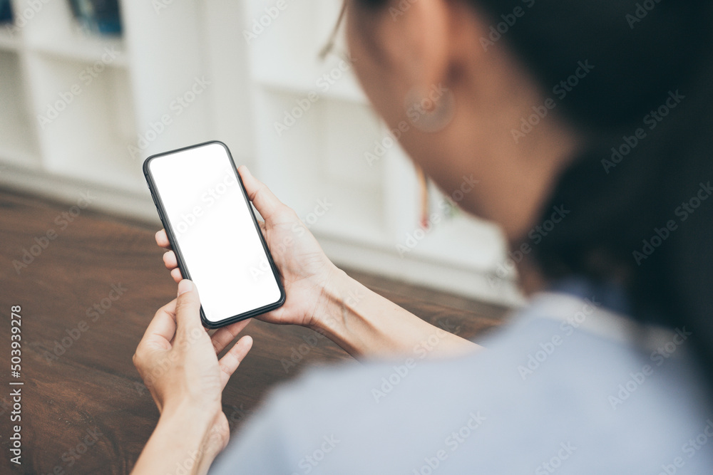 cell phone blank white screen mockup.hand holding texting using mobile on desk at office.background empty space for advertise.work people contact marketing business,technology cell phone blank white screen mockup.hand holding texting using mobile on desk at office.background empty space for advertise.work people contact marketing business,technology