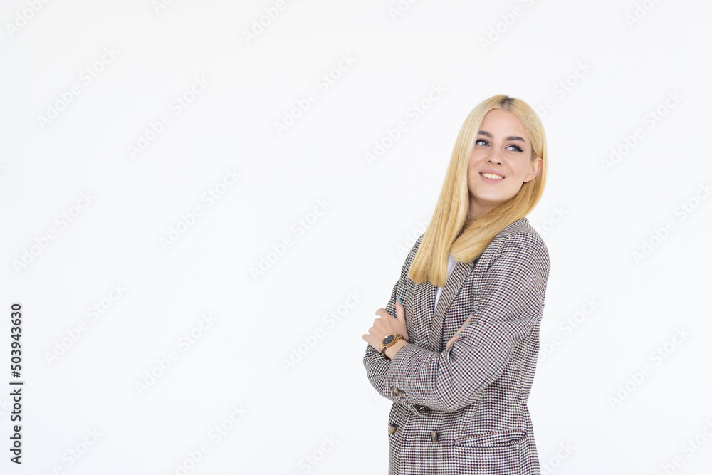 Portrait of a happy woman standing with arms folded on a white background Portrait of a happy woman standing with arms folded on a white background