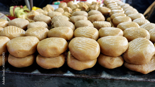Fotografie Row of indian sweets Peda