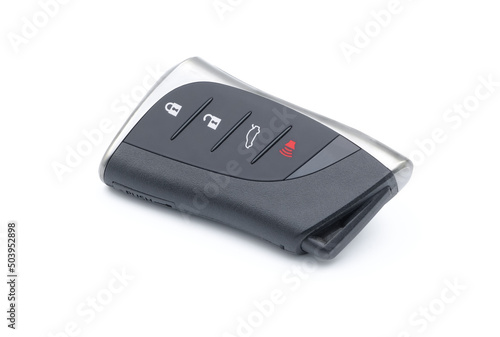 Smart car key with remote control for lock and unlock car isolated on white background.