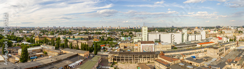 Kyiv, Ukraine – July 08, 2017: A beautiful panorama of Podil area. Aerial view on residential and industrial areas. A lot of buildings of different architectural style. Historical area, Dnipro river.