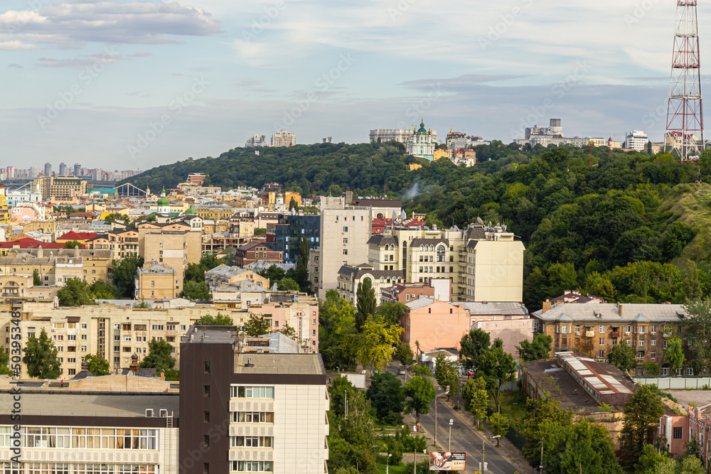 Kyiv, Ukraine – July 08, 2017: A beautiful panorama of Podil area. Aerial view on residential and industrial areas. A lot of buildings of different architectural style. Historical area, Dnipro river.