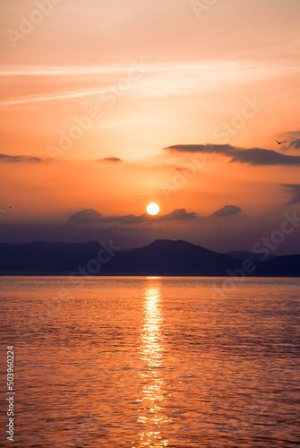 sunset over the ocean © Marian