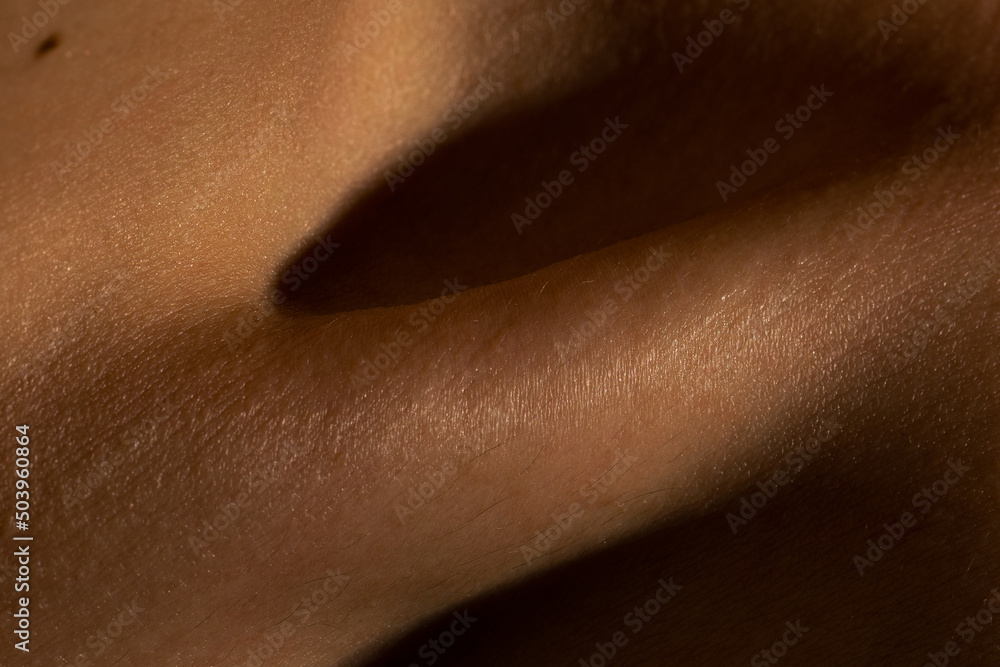 Close up part of woman's body. Detailed texture of human skin. Beauty, art, skincare, bodycare, healthcare, hygiene and medicine concept. Close up part of woman's body. Detailed texture of human skin. Beauty, art, skincare, bodycare, healthcare, hygiene and medicine concept.