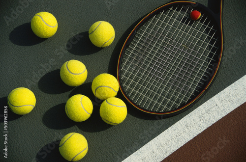 Tennis concept with balls and racket