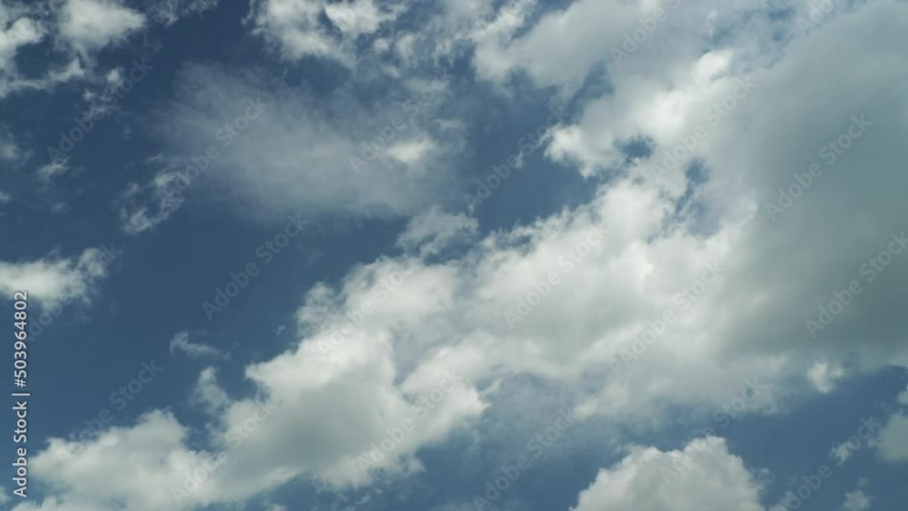 White clouds in the blue sky. Clouds float across the sky. White clouds in the blue sky. Clouds float across the sky.