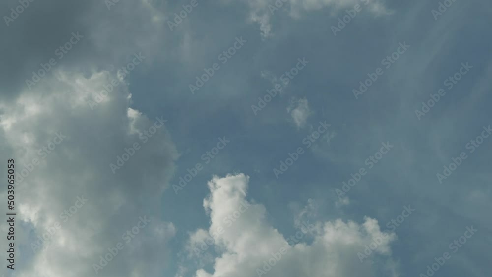 White clouds in the blue sky. Clouds float across the sky. White clouds in the blue sky. Clouds float across the sky.