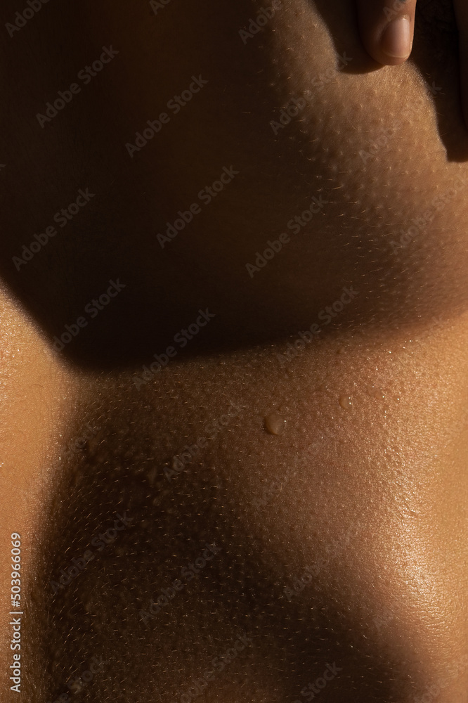 Close up part of woman's body. Detailed texture of human skin. Beauty, art, skincare, bodycare, healthcare, hygiene and medicine concept.