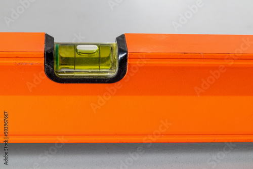 Spirit level with bubble level indicator. Measuring instruments for surface slope