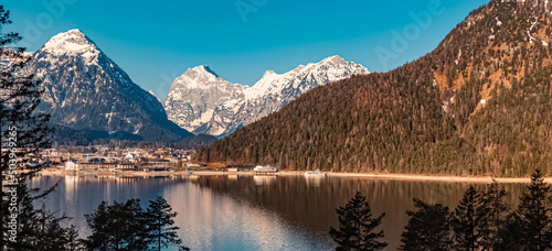 Beautiful winter view with reflections at the famous Achensee lake, Pertisau, Tyrol, Austria