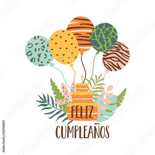 Feliz cumpleanos jungle cake. Feliz Cumpleanos means Happy Birthday in Spanish. Tropical birthday cake candle, balloons, jungle tropical leaves. photo