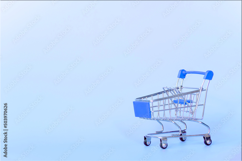 blue shopping cart with blue background