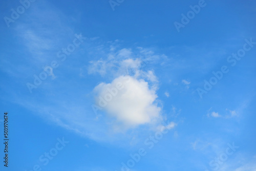 Fluffy Cumulus Clouds Floating on Bright Blue Sky