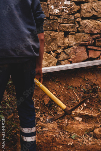 worker with shovel