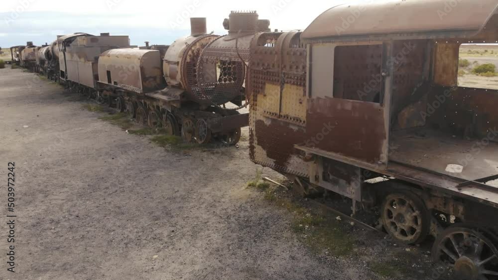 Abandoned Rusty Cars And The Locomotive Of An Old Train Abandoned Rusty Cars And The Locomotive Of An Old Train