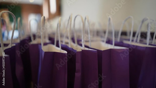 A bunch of gift bags in a party. photo