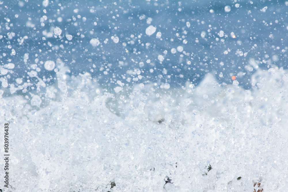 Sea foam with water splashes and drops background