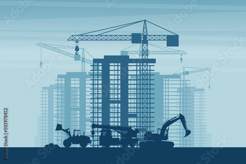 Background of heavy machinery such as front loader, truck crane, excavator, working on the construction of buildings in a city