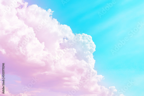 Delicate pink and white clouds in a blue sky